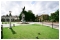 Photograph 3 of 9, July 2007: Two pigeons searching for breadcrumbs scattered next to Colchester's war memorial